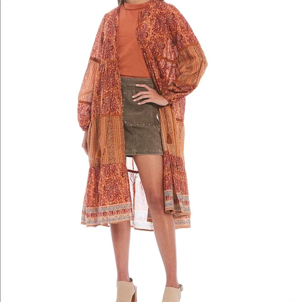 c&v chelsea and violet
   Front tie duster with mixed print size S, NWT.